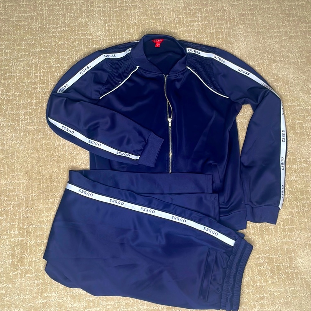 Guess navy jogger set with mesh shoulders and zipper.